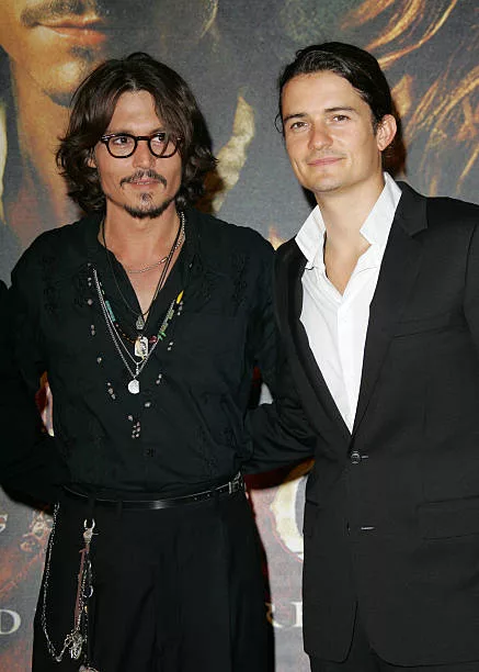 Johnny Depp and Orlando Bloom during "Pirates of The Caribbean: Dead Man's Chest" Paris Premiere at Gaumont Marignan Theater in Paris, France.