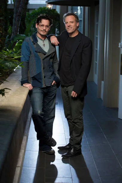 Actor Johnny Depp and director Wally Pfister are photographed for USA Today on April 1, 2014 in Los Angeles, California.