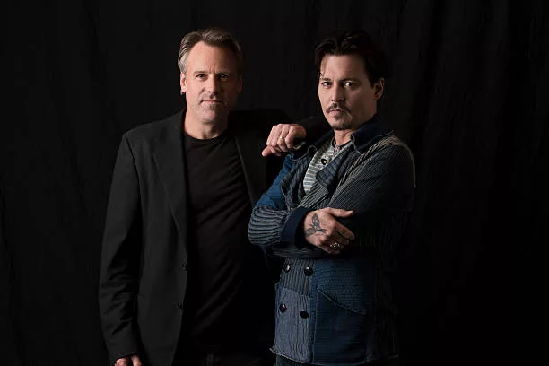 Actor Johnny Depp and director Wally Pfister are photographed for USA Today on April 1, 2014 in Los Angeles, California.