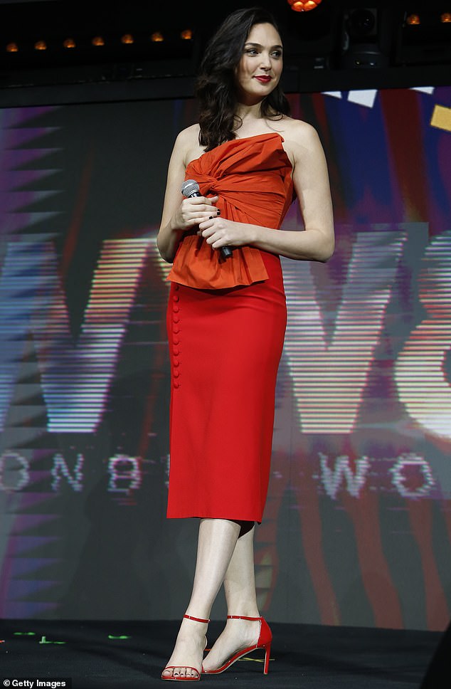 Gal Gadot shows off her edgy sense of style in statement orange and red dress as she attends Wonder Woman 1984 panel in São Paulo