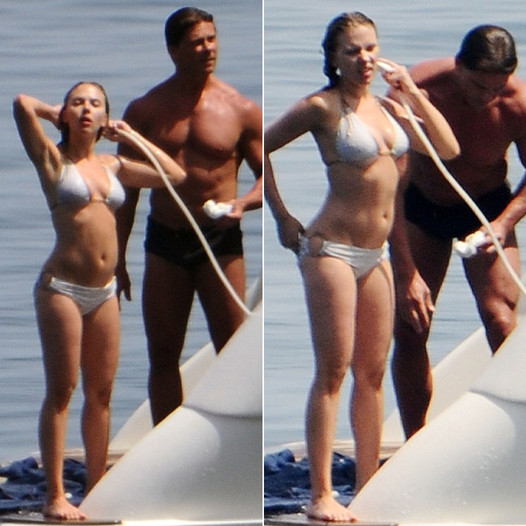 Watching her while she showers! Scarlett Johansson’s bodyguard is ‘on hand with the soap’ while she hoses down her bikini body