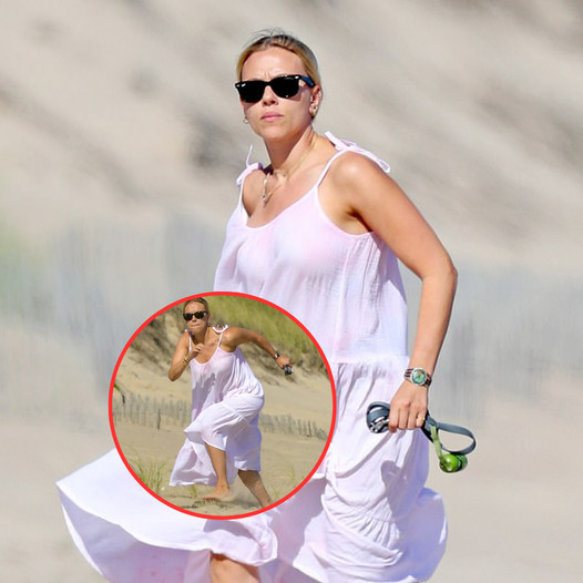 Scarlett Johansson Radiates Elegance in a Light Pink Sundress at the Beach! 🌊🌸